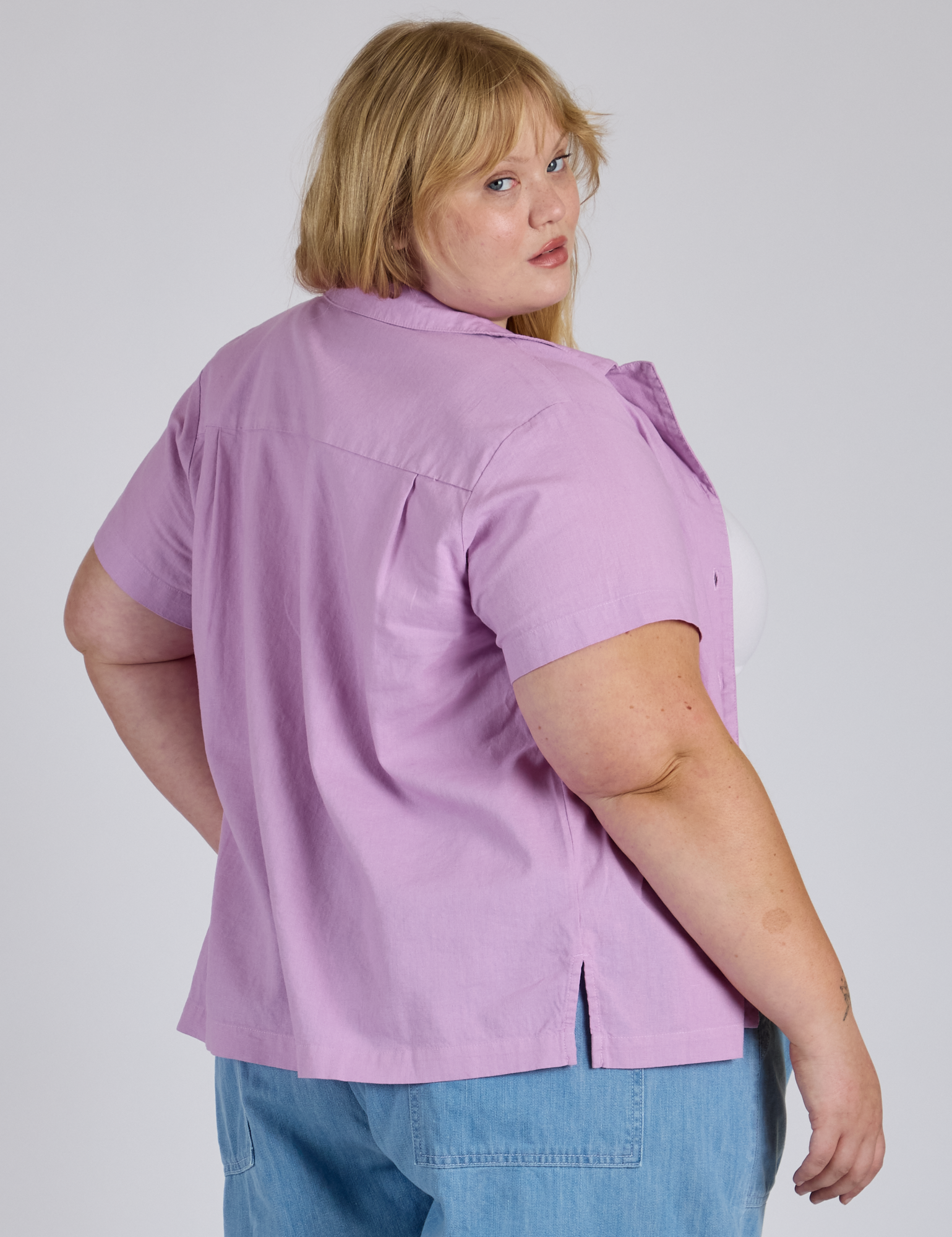 Angled back view of Pantry Button-Up in Lilac Purple on Juliet