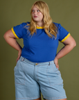 Vintage Ringer Tee in Royal Blue and light wash Carpenter Shorts on Juliet