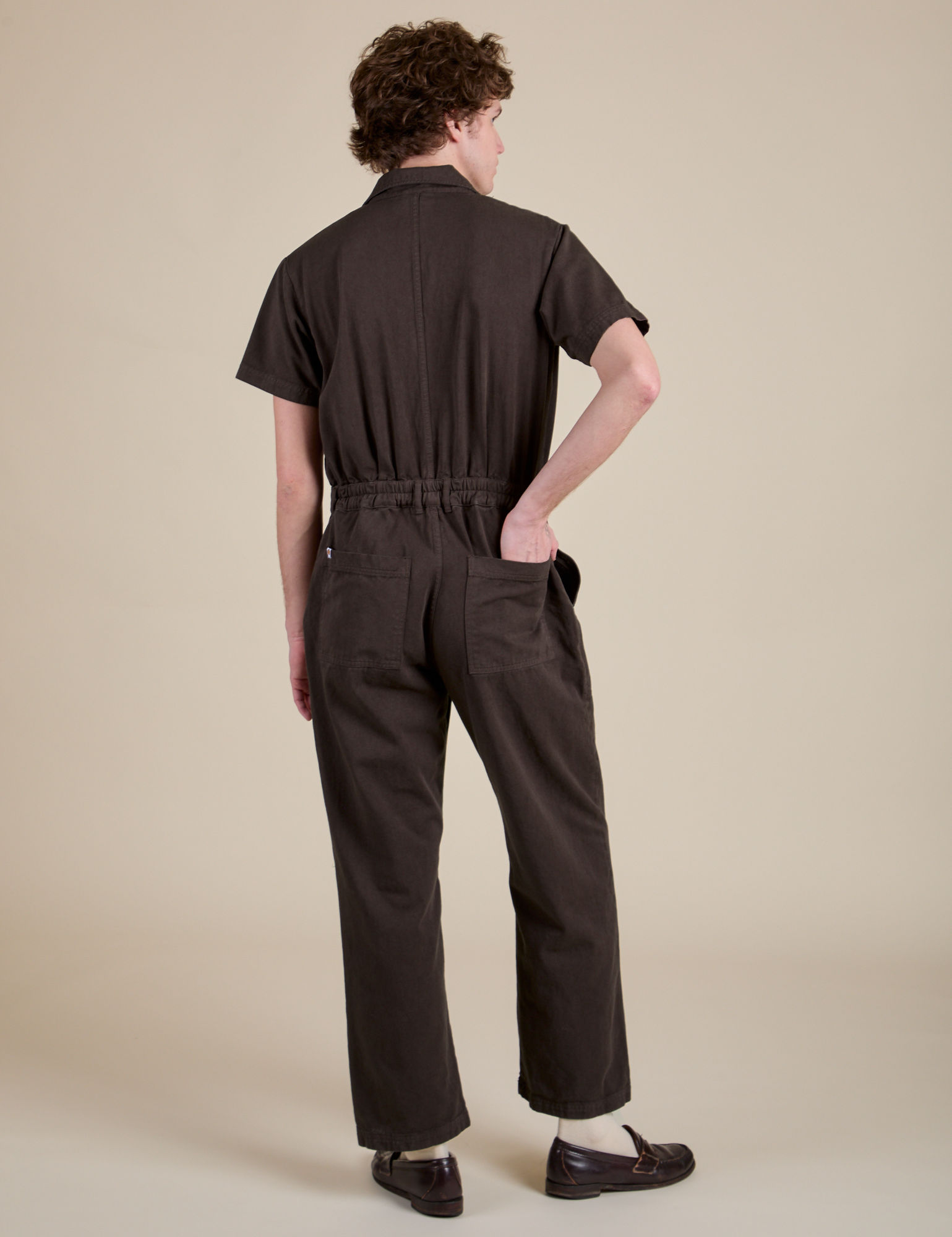 Short Sleeve Jumpsuit in Espresso Brown back view on Quinn