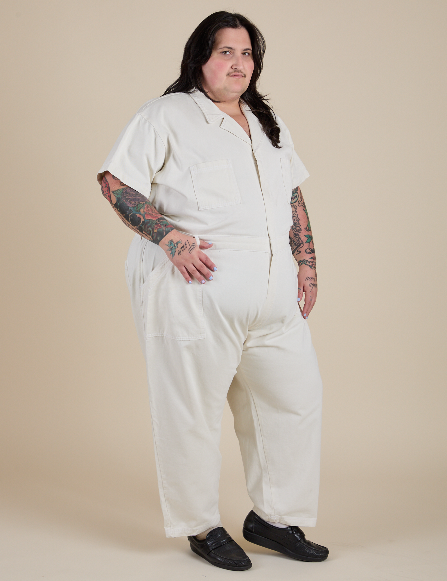 Angled front view of Short Sleeve Jumpsuit in Vintage Tee White on Sam