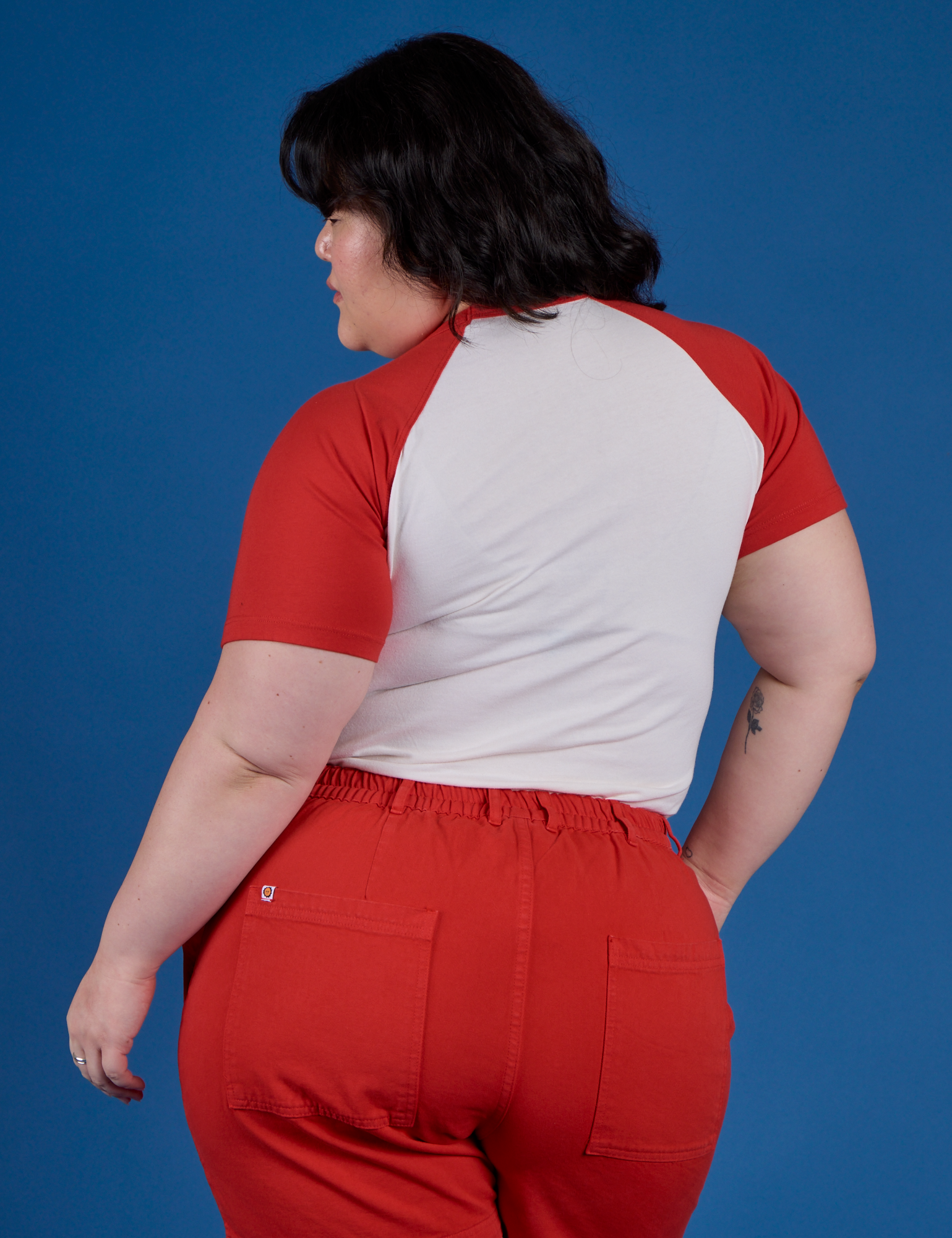 Back view of Produce Raglan Tee in Tomato on Ashley
