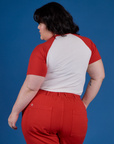 Back view of Produce Raglan Tee in Tomato on Ashley