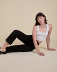 Work Pants in Basic Black and vintage tee white Cropped Tank worn by Alex