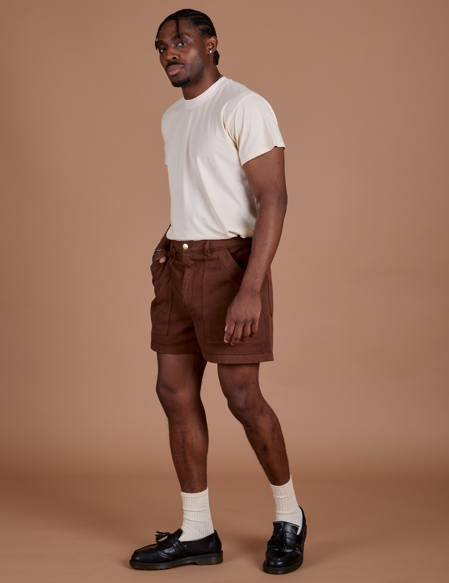 Angled front view of Classic Work Shorts in Fudgesicle Brown and Organic Vintage Tee in Vintage Off White