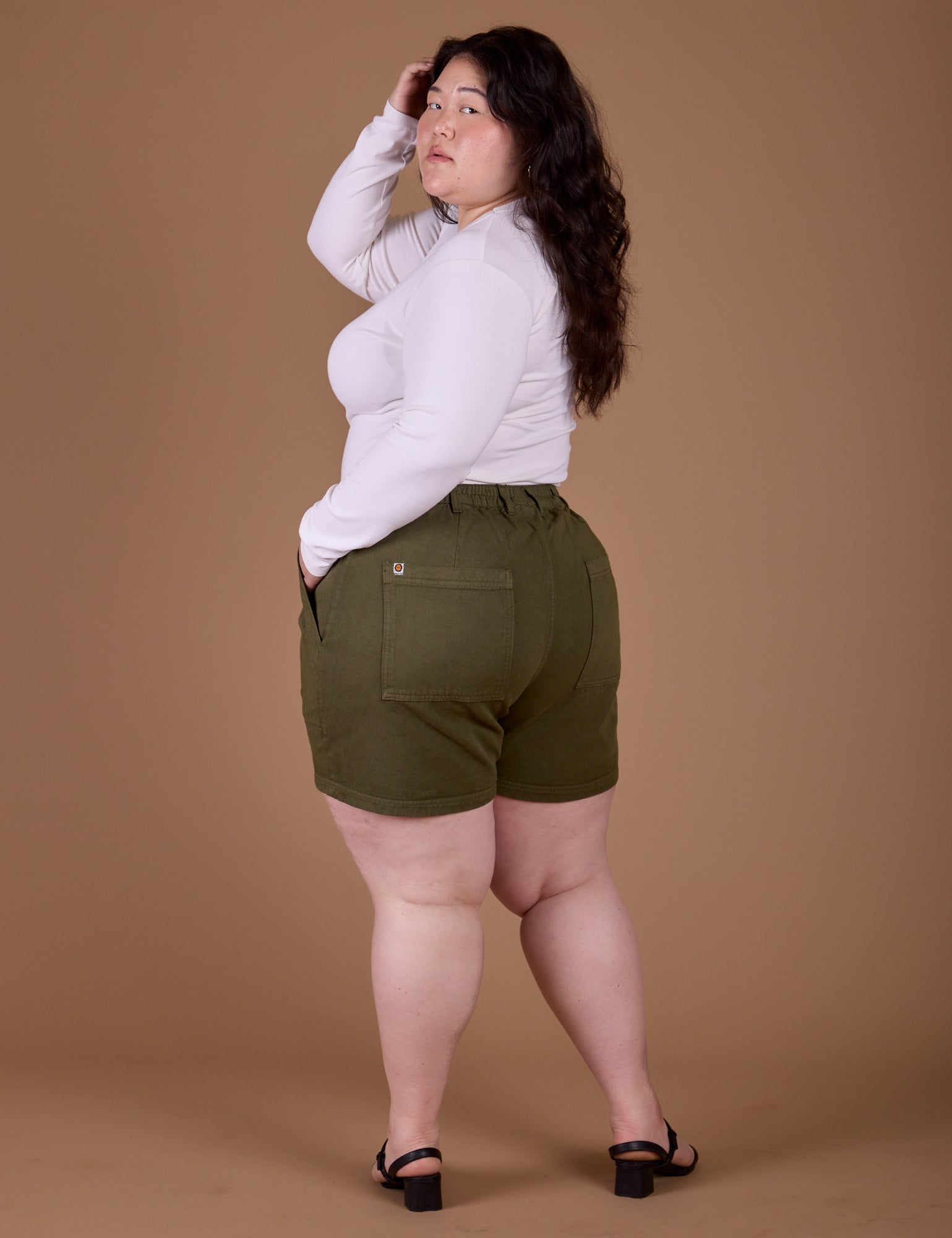 Classic Work Shorts in Surplus Green angled back view on Ashley