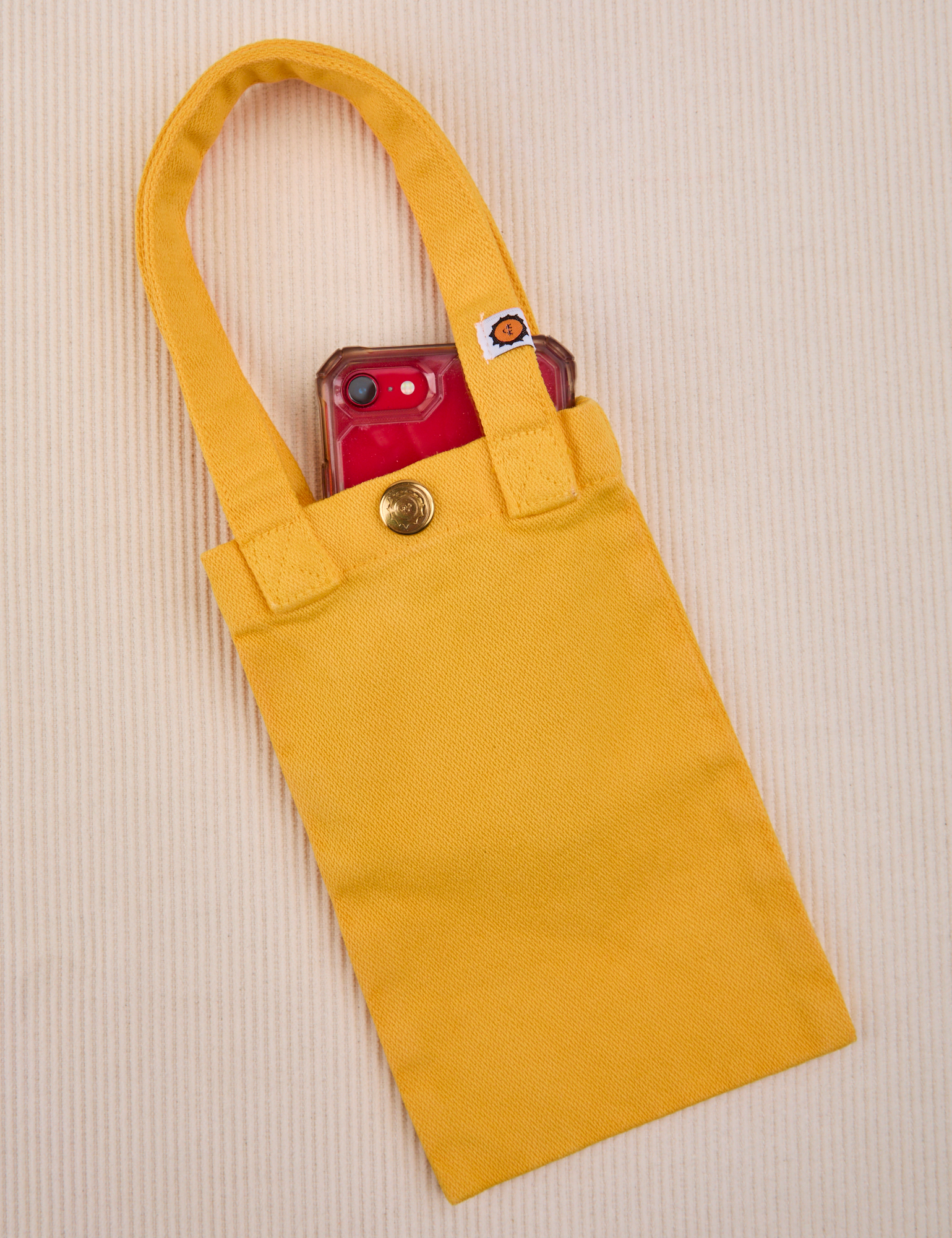 Phone tucked into sunshine yellow Cell Phone Tote