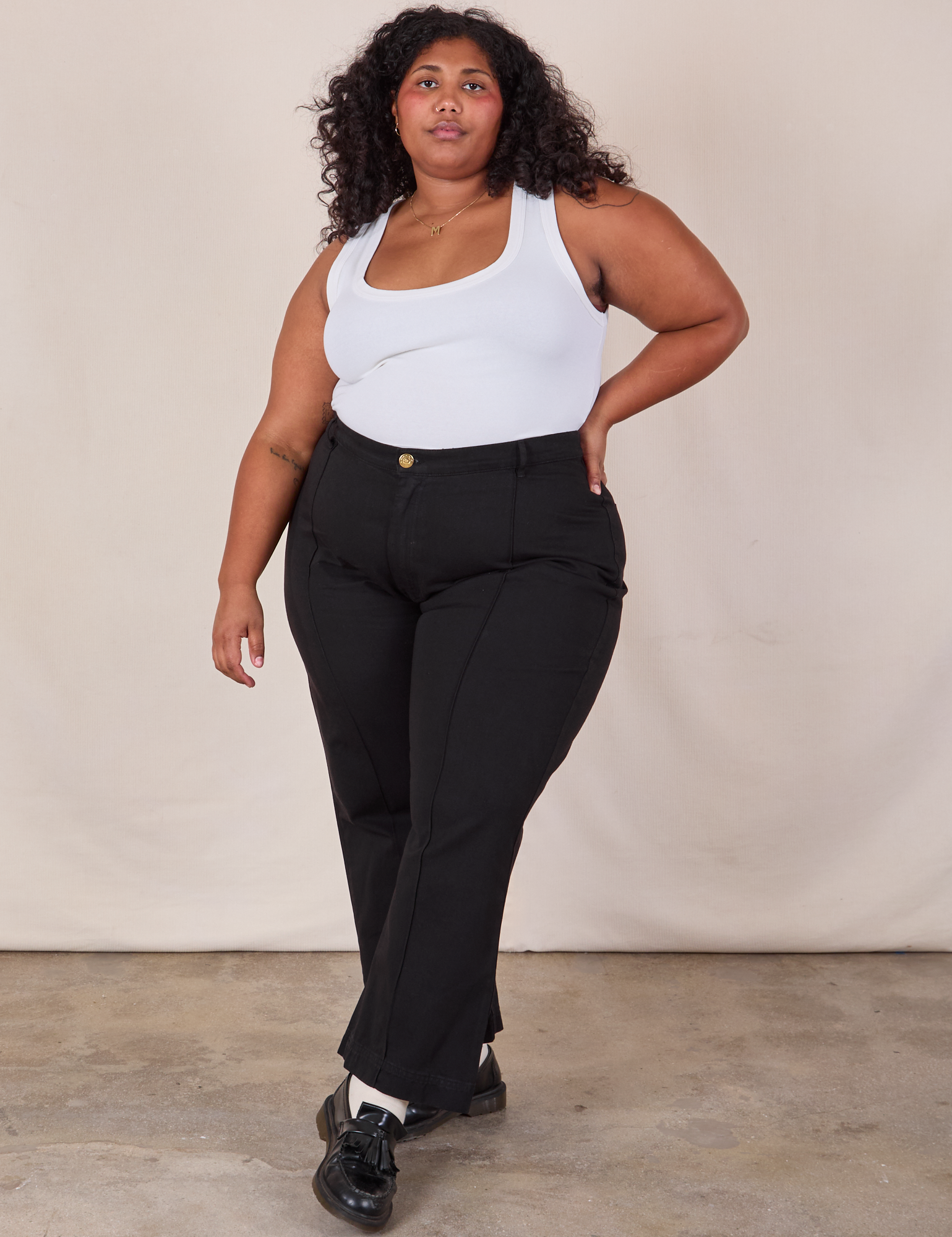 Western Pants in Basic Black and Cropped Tank in Vintage Tee Off-White worn by Morgan