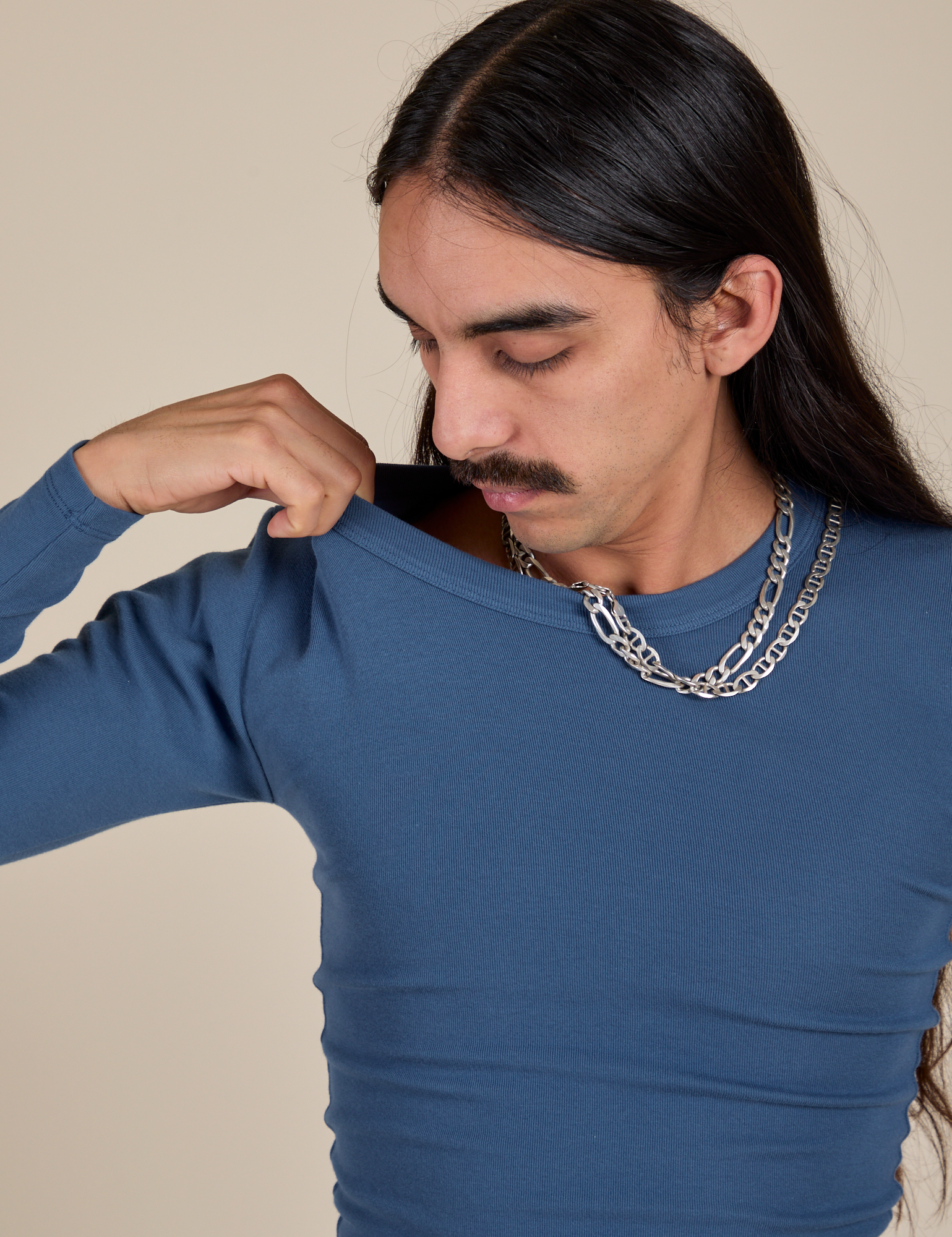 Long Sleeve Baby Tee in French Blue front close up on Anthony