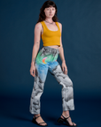 Angled front view of Work Pants in Night Sky Airbrush and mustard yellow Tank Top on Alex
