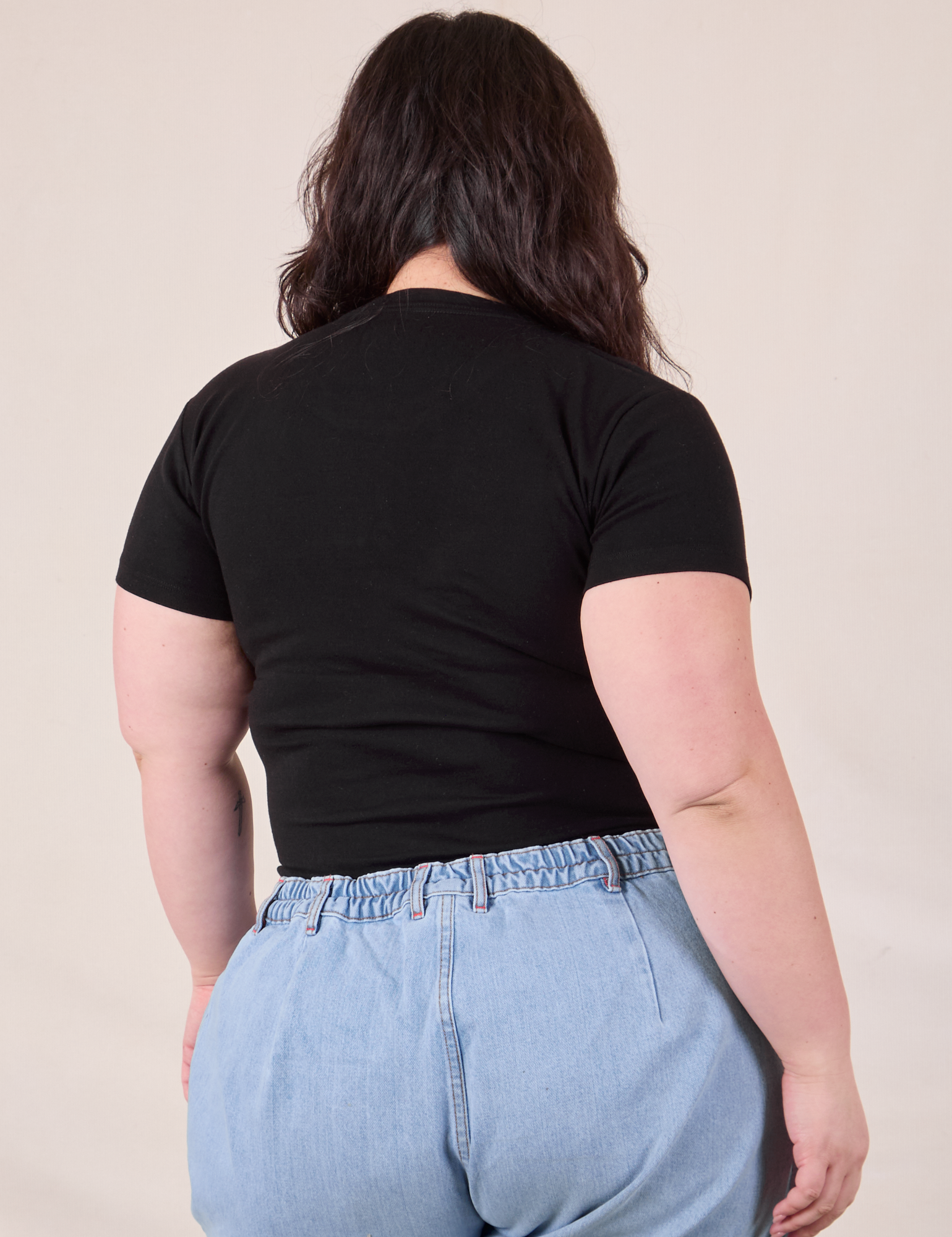 Baby Tee in Vintage Basic Black back view on Ashley