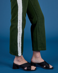 Painted Work Pants in Evergreen pant leg side view close up on Alex