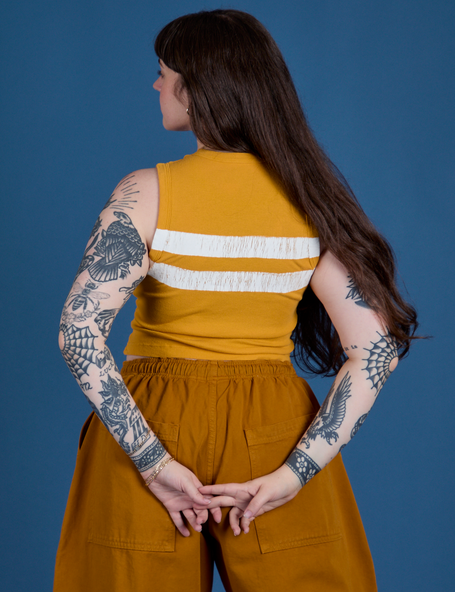 Painted Muscle Tee in Mustard Yellow back view on Sydney