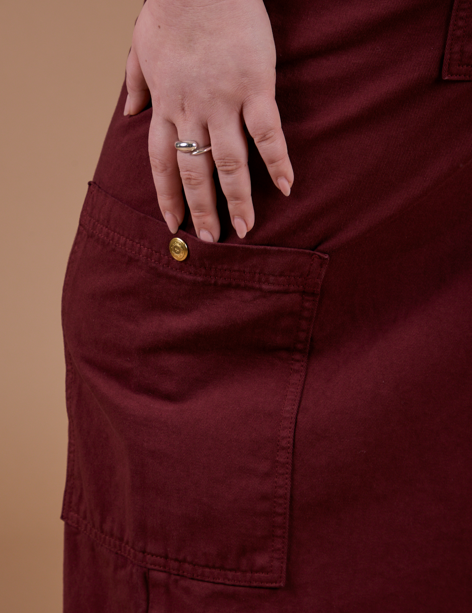Drop Pocket Cargo Pants in Red Wine side pant leg pocket close up