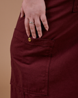 Drop Pocket Cargo Pants in Red Wine side pant leg pocket close up