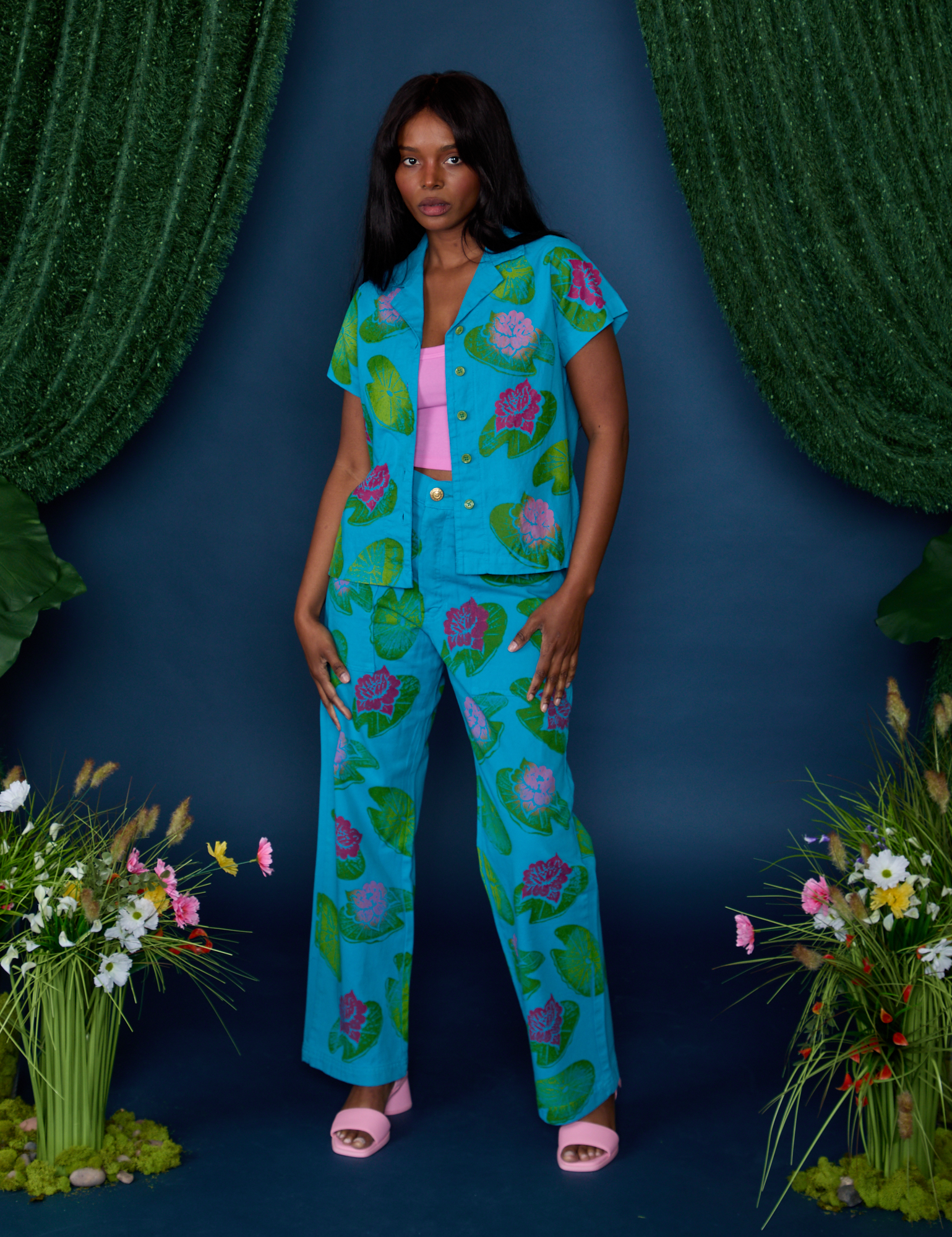 Kandia is wearing Paintstamped Pantry Button-Up in Lilypad with matching Work Pants