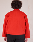Mechanic Jacket in Mustang Red back view on Miguel