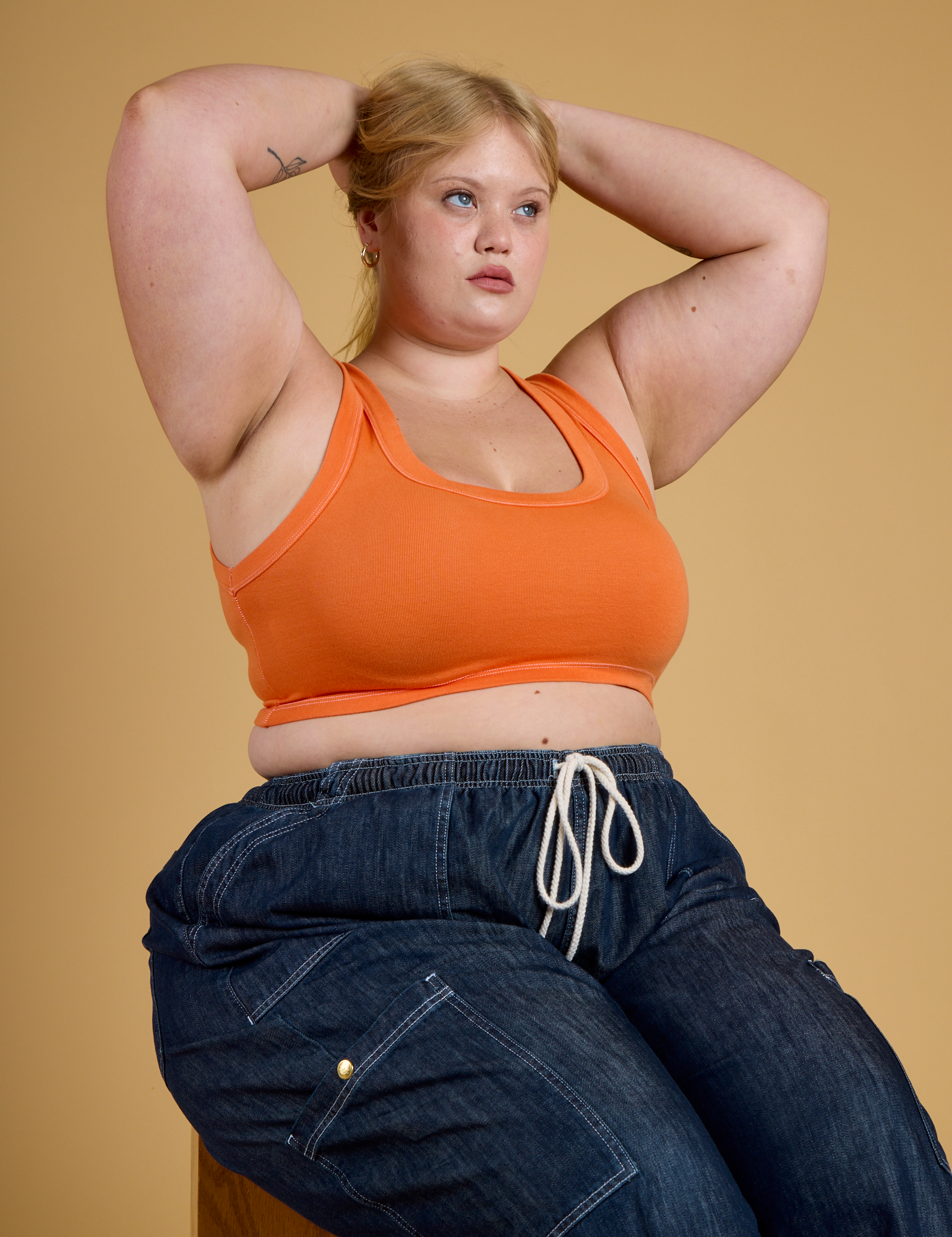 Contrast Stitch Mini Tank in Construction Orange and dark wash Denim Drop Pocket Pants on Juliet