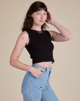 Angled front view of Muscle Tee in Basic Black on Alex