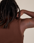 Back shoulder close up of Muscle Tee in Fudgesicle Brown on Demi