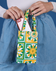 Spring Quilt Printed Cell Phone Tote with model putting in her phone