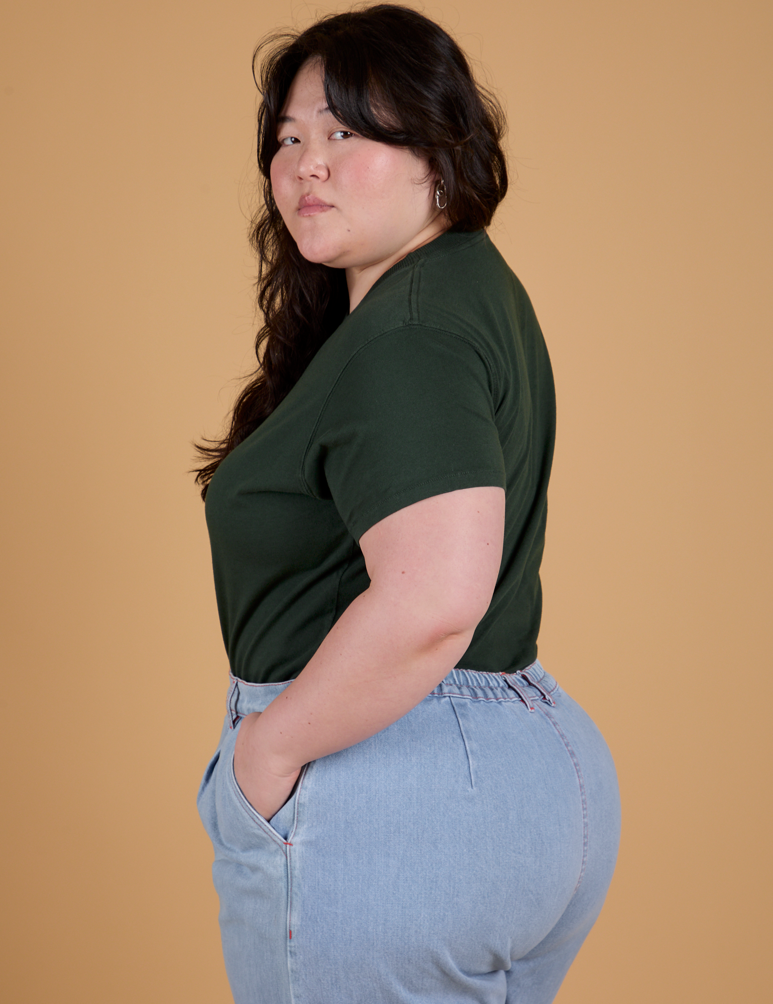 Organic Vintage Tee in Swamp Green side view on Ashley