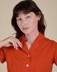 Pantry Button-Up in Chili Red front close up on Alex