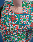 Close up of Ashley's hand in the back pocket of Work Pants in Quilt Print