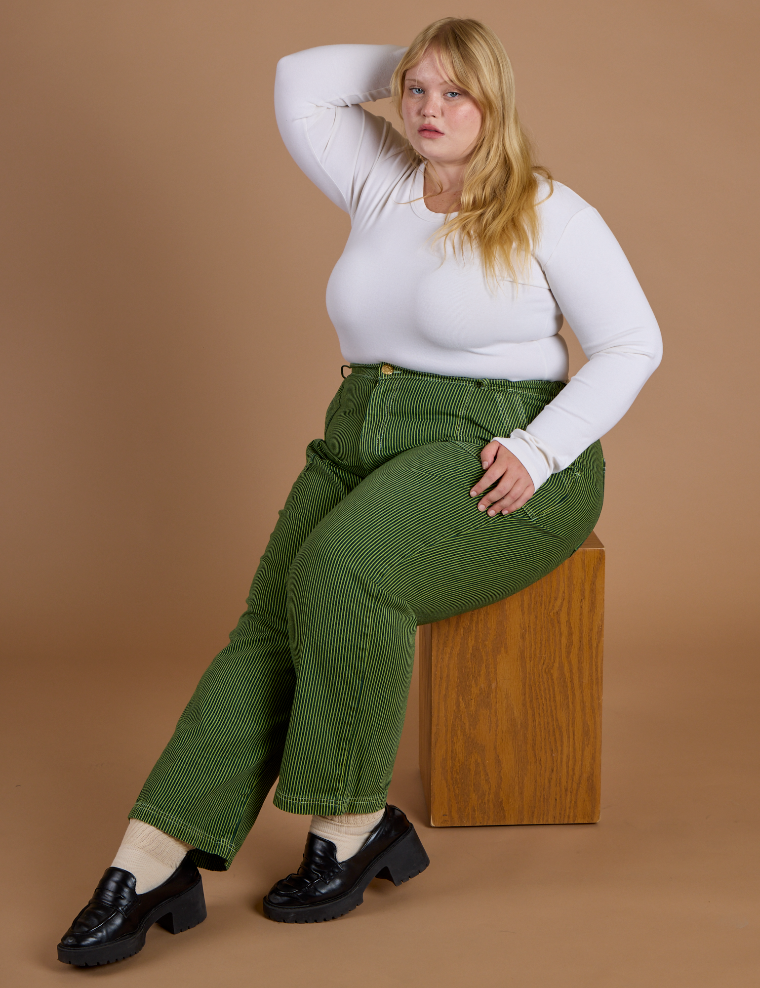 Railroad Denim Work Pants in Gross Green Overdye and vintage tee white Long Sleeve Baby Tee on Juliet