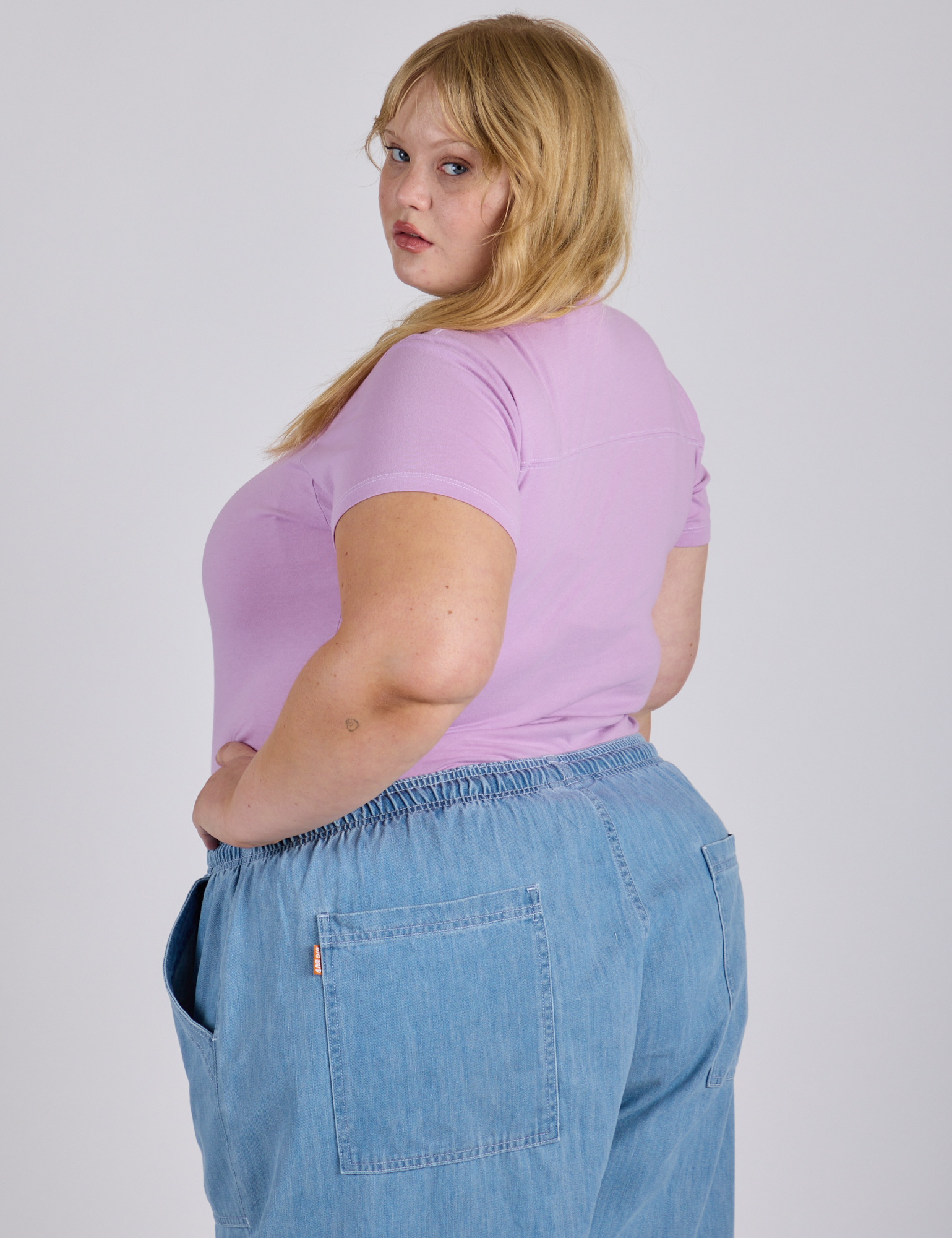 Jr. Varsity Tee in Lilac Purple angled back view on Juliet