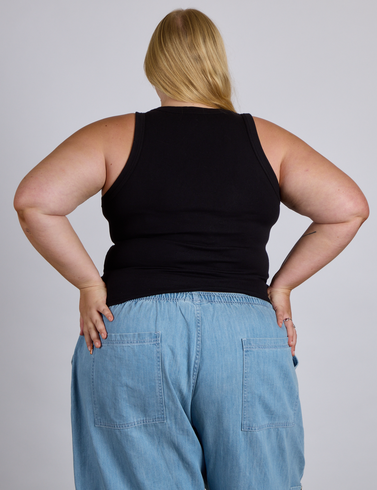 Back view of The Tank Top in Basic Black on Juliet