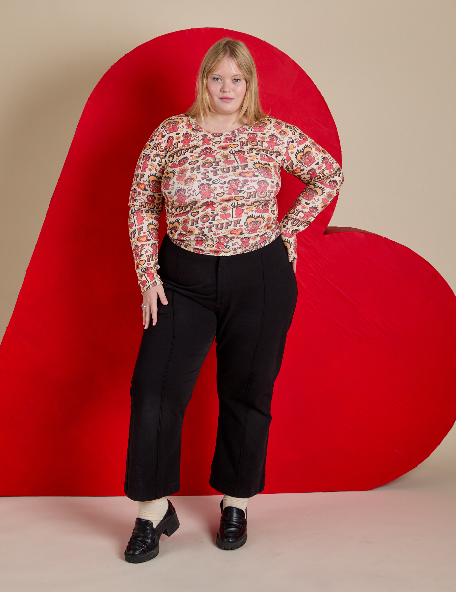 Long Sleeve Baby Tee in Hot Stuff Print and black Western Pants on Juliet