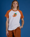 Grant is 6’5” and wearing L Produce Raglan Tee in Habanero