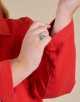Denim Work Jacket in Mustang Red sleeve close up on Juliet