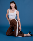 Painted Action Pants in Fudgesicle Brown and vintage tee white Cropped Tank worn by Alex