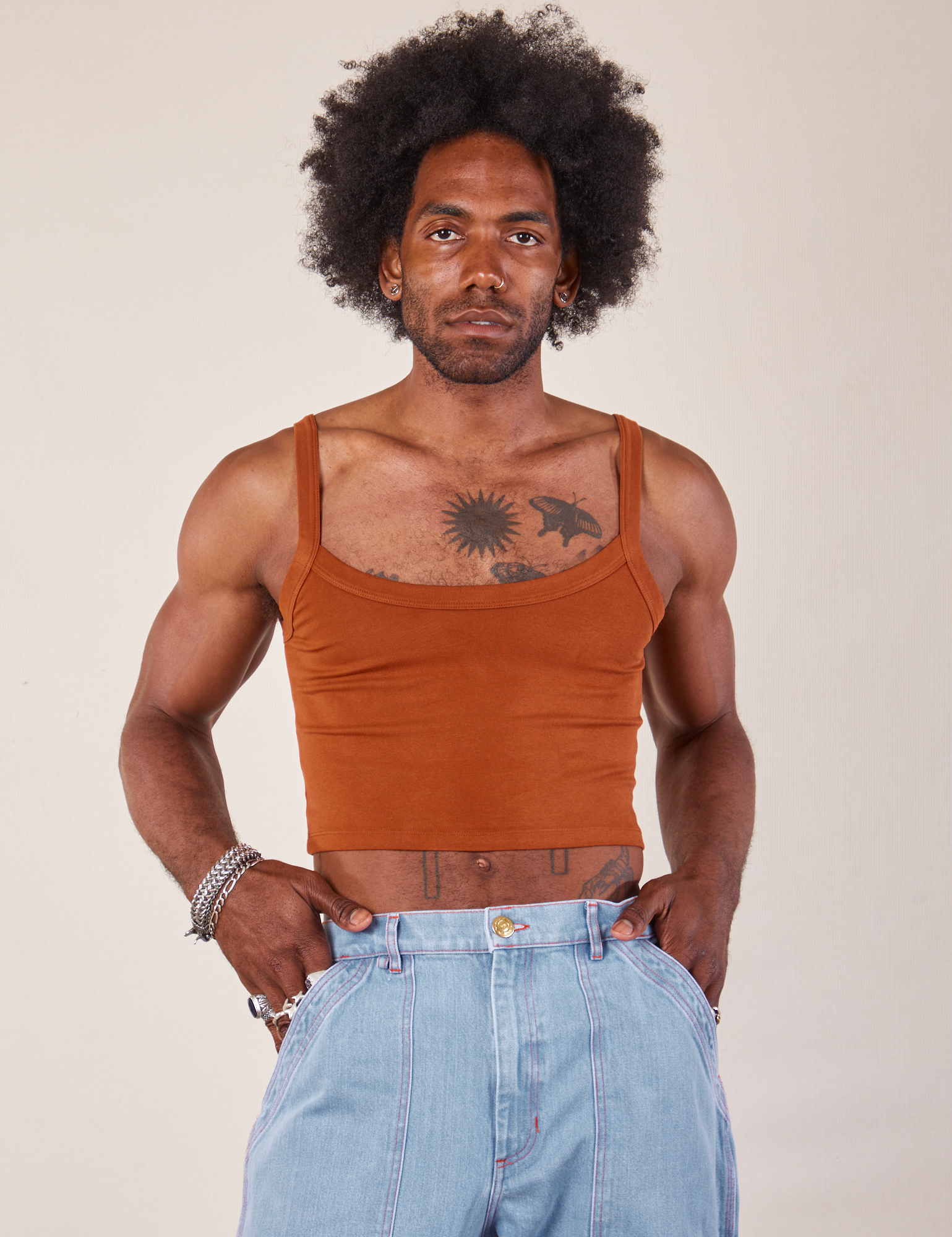 Jerrod is 6’3” and wearing S Cropped Cami in Burnt Terracotta