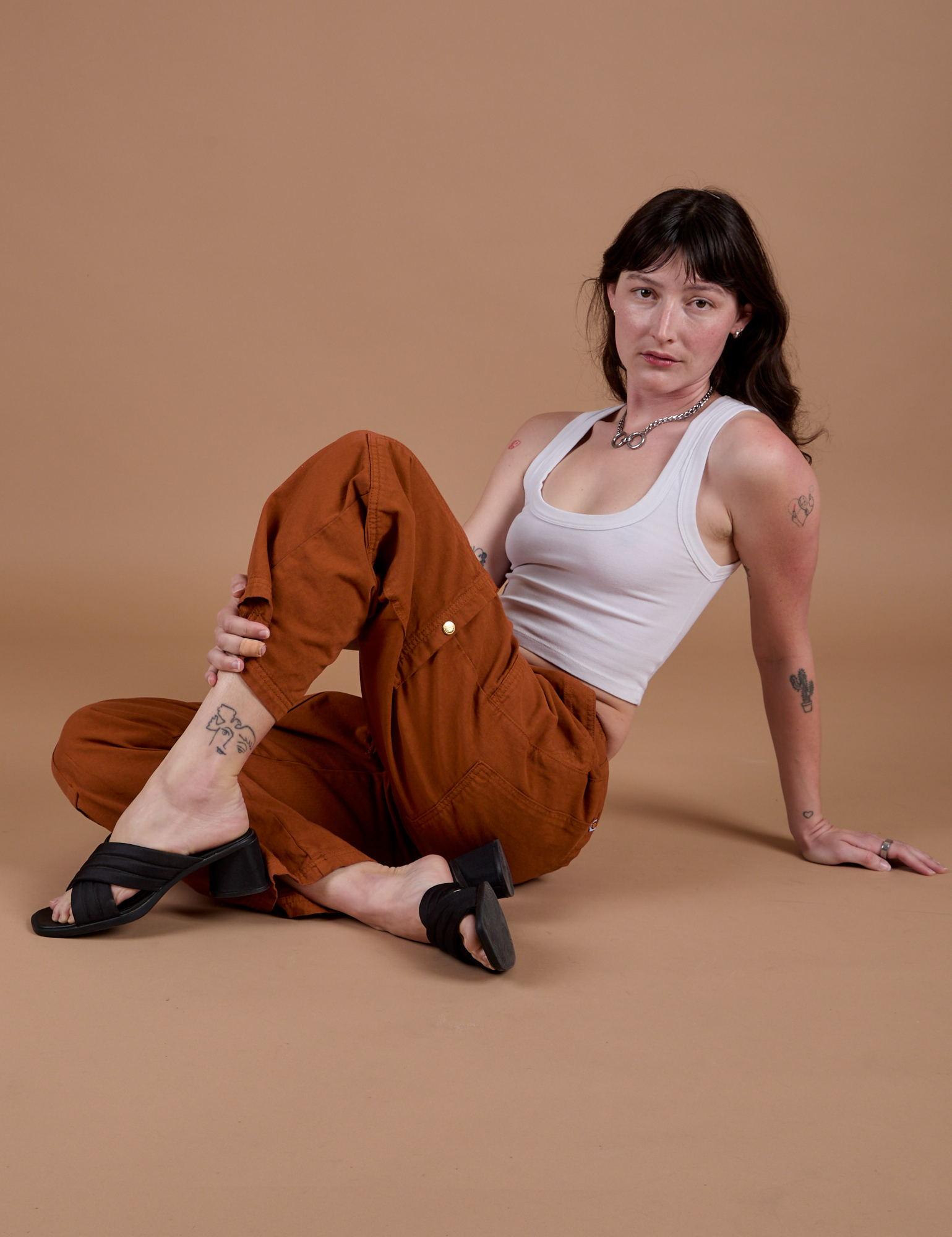 Drop Pocket Cargo Pants in Burnt Terracotta and Cropped Tank in Vintage Tee White on Alex
