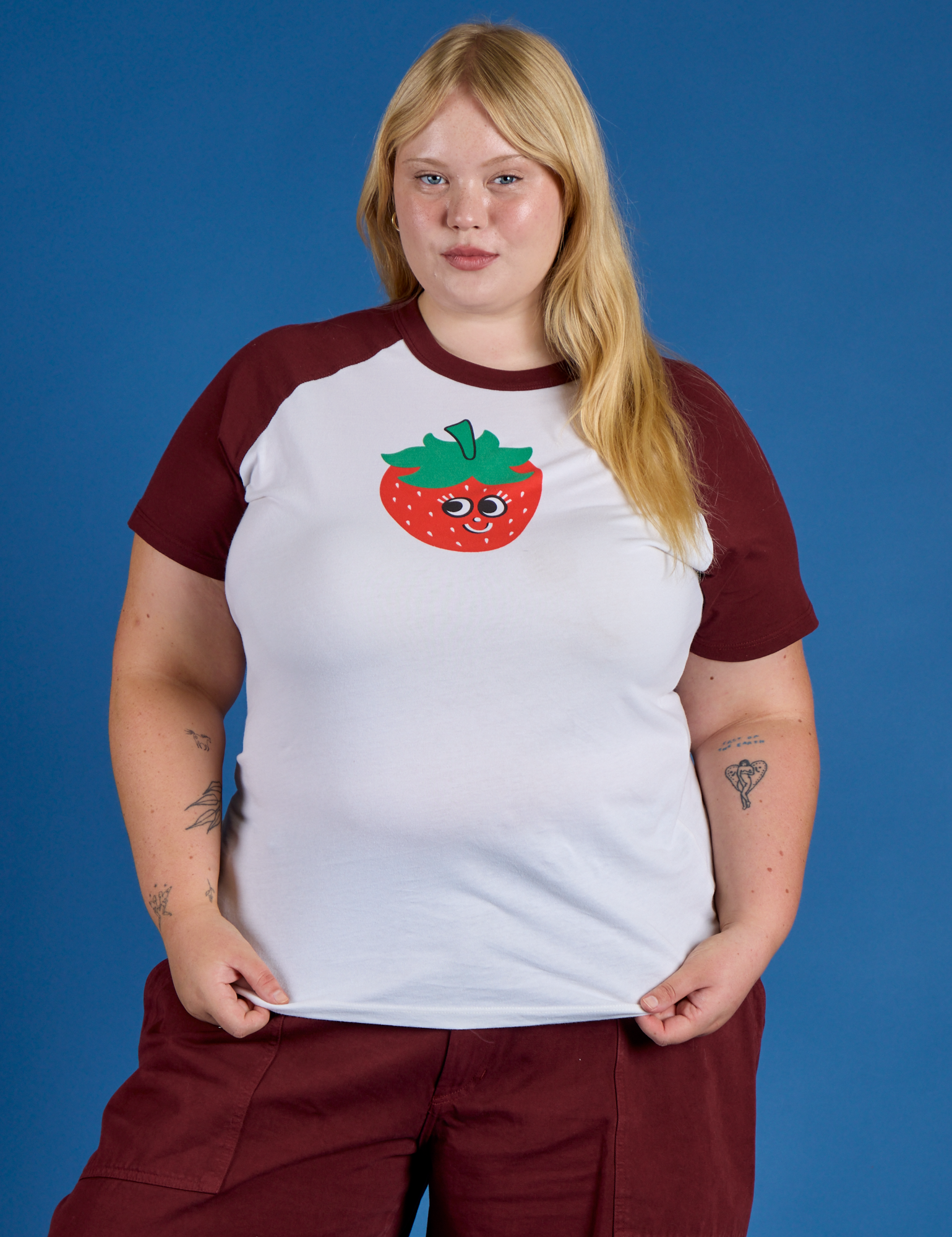 Juliet is 5’7” and wearing L Produce Raglan Tee in Strawberry