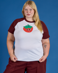 Juliet is 5’7” and wearing L Produce Raglan Tee in Strawberry