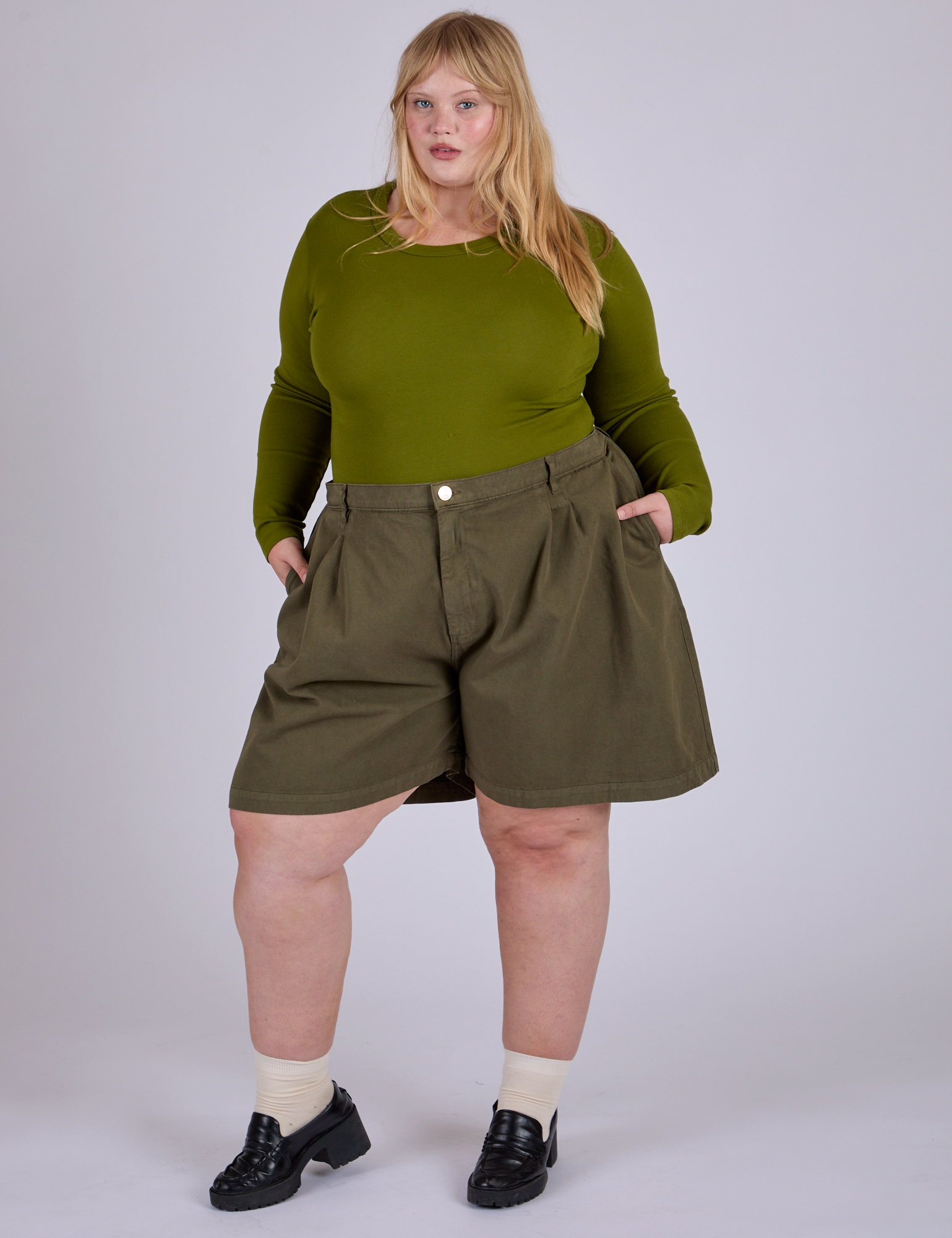 Pleated Trouser Shorts in Surplus Green and summer olive Long Sleeve Baby Tee worn by Juliet