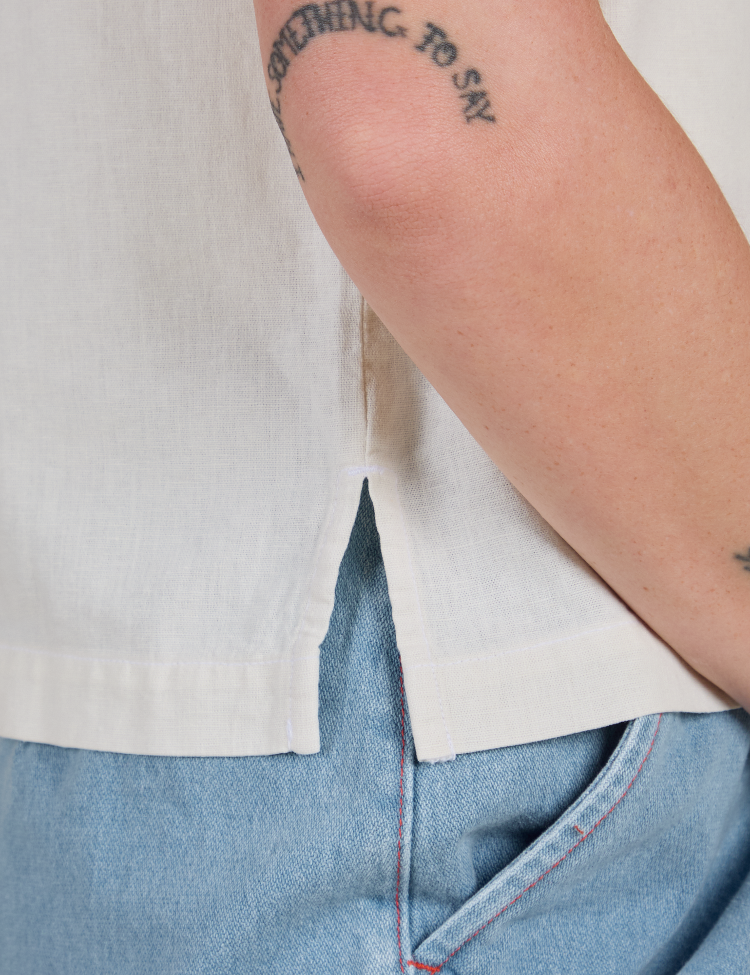 Pantry Button-Up in Vintage Tee White side vent close up on Alex