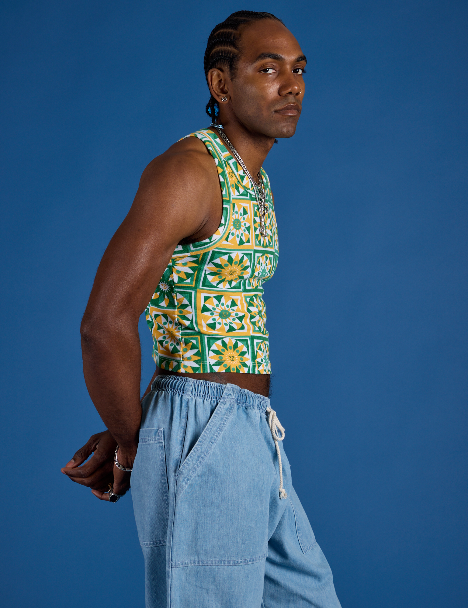 Deep-Cut Racerback Tank in Spring Quilt Print side view on Jerrod