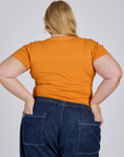 Jr. Varsity Tee in Creamsicle Orange back view on Juliet