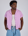 Isaac is 5’10” and wearing M Pantry Button-Up in Lilac Purple