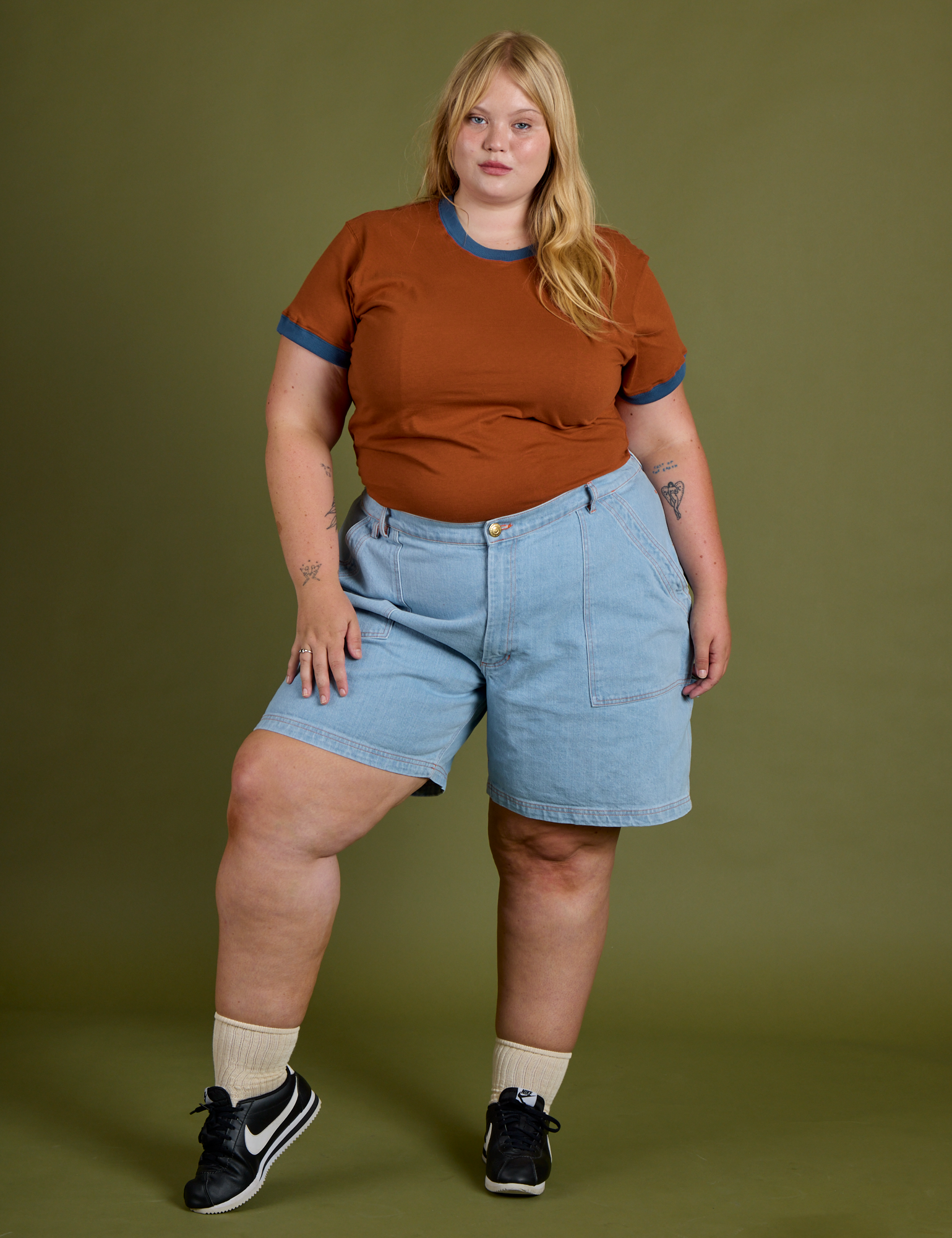 Vintage Ringer Tee in Burnt Terracotta and light wash Carpenter Shorts on Juliet