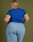 Back view of Vintage Ringer Tee in Royal Blue and light wash Carpenter Shorts on Juliet