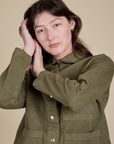 Denim Work Jacket in Surplus Green front close up on Alex