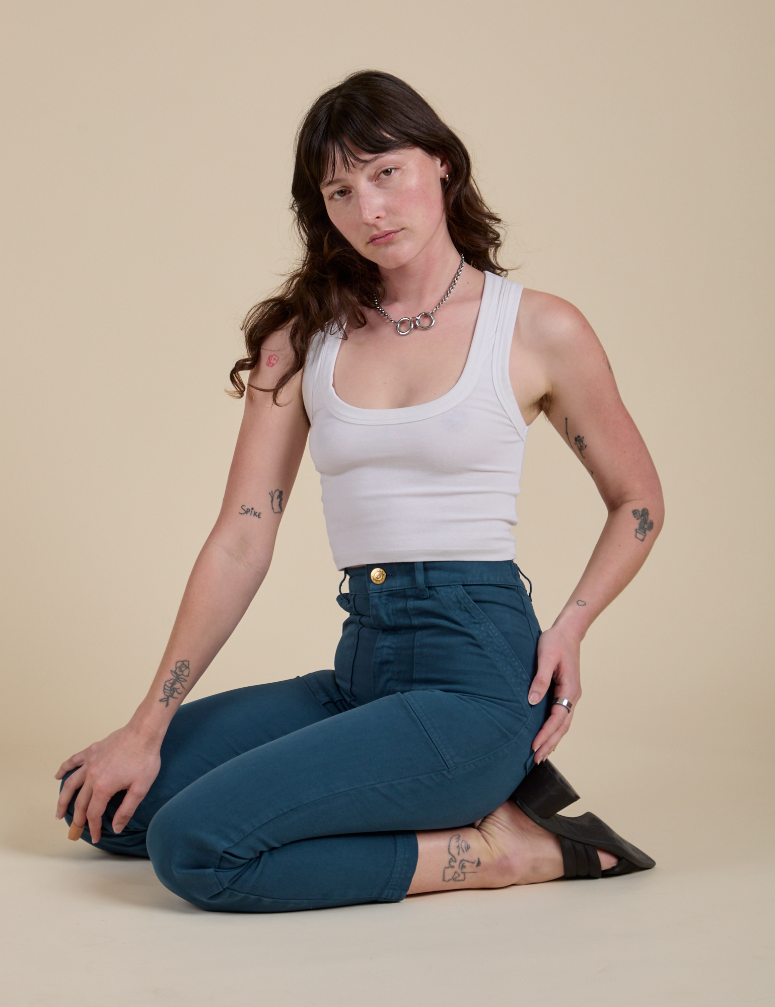 Work Pants in Lagoon and vintage tee white Cropped Tank worn by Alex