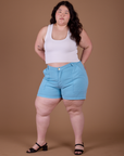 Ashley is 5’7” and wearing 1XL Classic Work Shorts in Baby Blue paired with vintage off white Cropped Tank