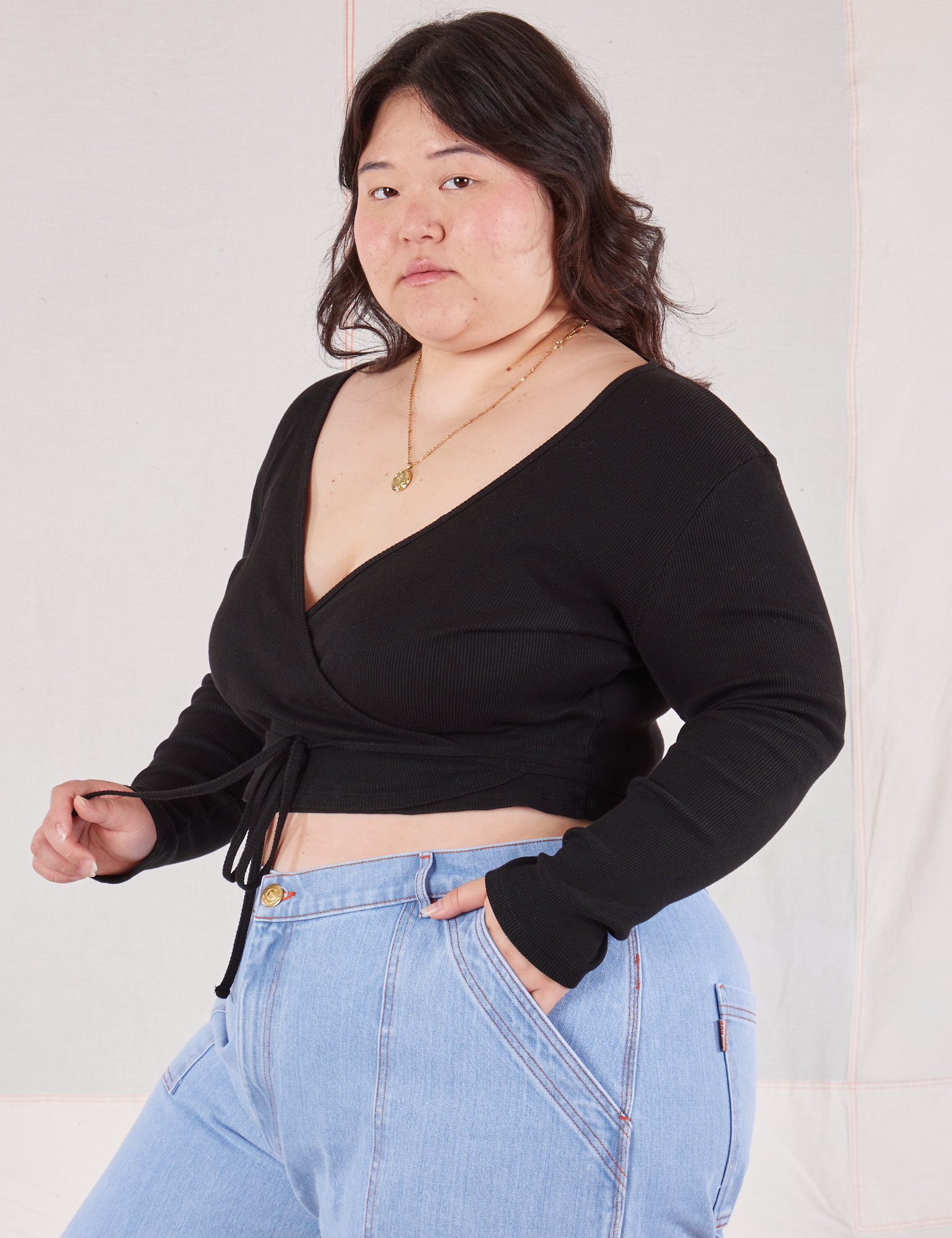 Wrap Top in Basic Black angled front view on Ashley