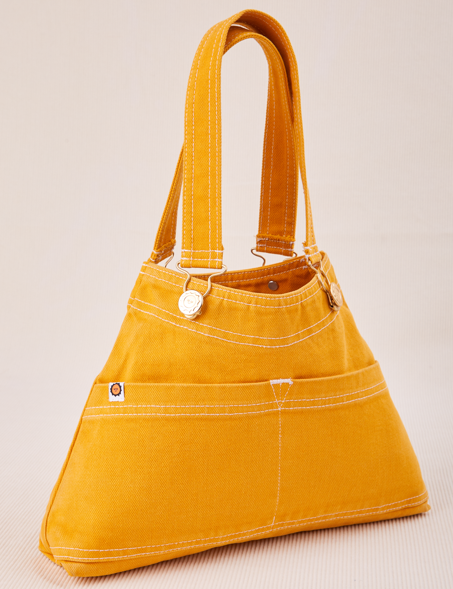 Overall Handbag in Mustard Yellow angled view